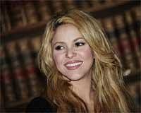 Colombian singer Shakira poses for the photographers at the Oxford University Union library after delivering a speech about universal access to education at the Union, in Oxford, England on Monday. AP