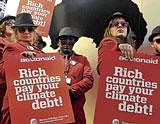 A call for action:  Environmental activists of the Danish organisation MS ActionAid demonstrate at the Bella Center in Copenhagen, the venue of the UN climate conference, on Wednesday. AFP