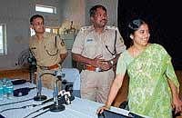 District Information Officer Rohini K launching the DK police website at SP office in Mangalore on Wednesday. SP Dr A Subramanyeshwar Rao and ASP Amit Singh look on.