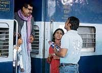 funny Paresh, Konkona and Ajay at the station.