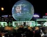 A large globe featuring an interactive display sits in a central square in Copenhagen. Reuters