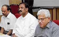 In Discussion: Former vice-chancellor of Bangalore University Dr N R Shetty, Higher Education Minister Aravind Limbavali and Higher Education department Principal Secretary Srikanth attending a meeting to discuss Karnataka State University Act Amendment Committee report in Bangalore on Monday. DH Photo