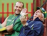 ALL SMILES: South Africa's Jacques Kallis (left) and coaching consultant Duncan Fletcher during a training session. REUTERS