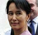 A file picture taken on November 4, 2009 shows Myanmar's detained democracy icon Aung San Suu Kyi as she greets a US delegation during a rare public appearance at a hotel in Yangon.AFP