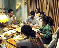 Bollywood actor Aamir Khan having dinner with former cricket captain Sourav Ganguly and his family while paying a short visit to cricketer's Behala residence in Kolkata on Tuesday late night. PTI