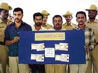 In Police Net: Four held in a fake currency racket busted in Hubli on Wednesday. DH Photo