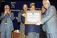Siddharth receiving the Helen Keller award from Union HRD Minister Kapil Sibal in New Delhi recently.