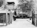 This picture taken in April 1945 depicts the Auschwitz concentration camp gate, with the inscription Arbeit macht frei.  AFP