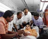 Power Of Vote: MLC Kailash arriving in an ambulance to cast his vote in the Council election in Bangalore on Friday. DH Photo