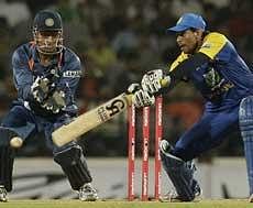 on fire: Tillakaratne Dilshan slams one to the fence during his century in Nagpur on Friday.  reuters