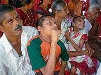 cursed: Endosulfan affected persons at a meeting attended by former minister Shobha Karandlaje at Upparapalike near Kokkada on Saturday. dh photo