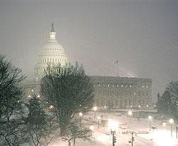 The US Capitol is seen during the snow storm as the health care debate continues in the Senate into the evening on Capitol Hill in Washington on Saturday. AP