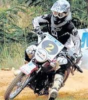 Man and machine: Team TVS KP Arvind takes a turn during his win in the Group B 4s (131-165) section on Sunday.