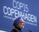 Prime Minister Manmohan Singh talks during the plenary session at the climate summit in Copenhagen, Denmark on Friday. AP
