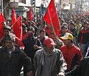 Nepal's Maoist supporters march the streets on the second day of the three-day strike in Katmandu, Nepal on Monday. AP