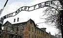 An exact replica of the Arbeit Macht Frei sign, which was hung in place of the original that was stolen on Friday. AP