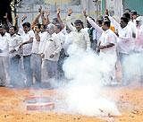 JD(S) and Congress workers celebrate after the announcement of the Council poll results in Bangalore on Monday.  KPN