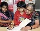 inspiring Sudha Murthy interacting with the children.
