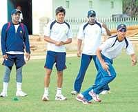 Sweating it out: Karnatakas Sunil Joshi (left), Manish Pandey, Amit Verma  and skipper Rahul Dravid at a practice session in Mysore on Tuesday. DH photo