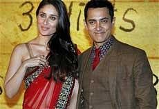 Bollywood actor Aamir Khan along with actress Kareena Kapoor at the premiere of '3 Idiots' in Mumbai on Wednesday night. PTI Photo
