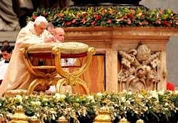 Pope Benedict XVI celebrates the Christmas night holy mass at St. Peter's Basilica at Vatican to mark the nativity of Jesus Christ