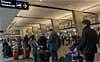 Travelers to the United States face stricter security measures . AP