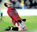 Manchester Uniteds Wayne Rooney celebrates scoring against Hull City on Sunday. AFP
