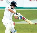 Englands Alastair Cook cuts en route to his  hundred against South Africa at Durban on Monday. AP