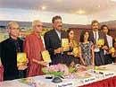 Printania Offset Pvt Ltd Chairman Albert W DSouza (third from left), releasing Vozram, a collection of about 3,500 Konkani short poems in Mangalore on Tuesday.  DH photo