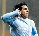 jubilant Manchester Citys Carlos Tevez celebrates after scoring against Wolverhampton Wanderers on Monday. AP