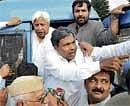 Fulfil demand: Congress leaders being arrested  in Bangalore on Tuesday.  DH photo