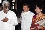 The couple with scholar Bannanje Govindacharya.