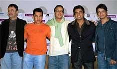(L-R) Crew of '3 Idiots' Director Raju Hirani, actor Aamir Khan, Producer Vidhu Vinod Chopra and actors R Madhaban and Sharman Joshi at a promotional event in Kolkata on Thursday. PTI