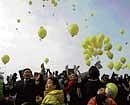 South Korean conservative activists release balloons with some leaflets condemning North Korean leader Kim Jong II during a rally at the Imjingak Pavilion, near the demilitarised zone of Panmunjom that separates the two Koreas, in Paju, South Korea, on Friday. AP