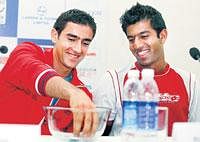 Whose name is it now?: Croatias Marin Cilic (left) picks the draw for the ATP Chennai Open on Saturday while Indias Rohan Bopanna looks on. AP