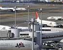 This photo taken on January 3, 2010 shows Japan Airlines (JAL) passenger planes on the tarmac of Tokyo's Haneda airport. AFP Photo