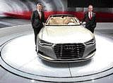 Audi officials with the new vesrion SUV at Auto Expo