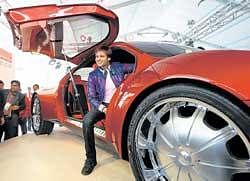 Star of the show: Actor Vivek Oberoi sits inside the first car of DYP-DC Centre for Automative Research and Studies during the launch of the institution at 10th Auto Expo 2010 at Pragati Maidan in New Delhi on Wednesday. PTI