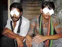 Two men affected by toxic Chinese silk in Magadi taluk. DH Photo