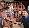 Actor Srinath sharing a lighter moment with schoolchildren during the inauguration of childrens film festival in Bangalore on Thursday. DH photo