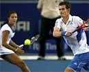 Britain's Andy Murray, right, and Laura Robson play a return to Russia's Elena Dementieva and Igor Andreev during their doubles match at the Hopman Cup tennis tournament in Perth, Australia on Friday . AP