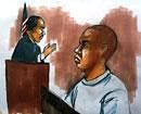 This courtroom drawing shows Umar Farouk Abdulmutallab, 23, right, charged with attempting to blow up a Detroit-bound U.S. airliner, at his hearing in Detroit federal court on Friday. AP