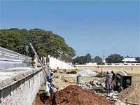 Renovating: The renovation works undertaken at Jhansi Rani Lakshmibai stadium in Chintamani.(Inset) A view of the stadium. DH Photo