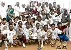 JUbilant: The victorious Karnataka team pose with the Dr BC Roy Trophy in Mandya on Sunday. Dh photo