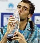 ITS MINE Croatian Marin Cilic poses with the Chennai Open trophy which he retained on Sunday. PTI