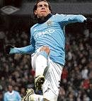 leap of joy Manchester Citys Carlos Tevez celebrates after scoring against Blackburn Rovers on Monday. afp