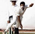 fast and furious: Karnataka paceman A Mithun was in his elements again on Tuesday,   picking up four wickets in Mumbais second innings. dh photo/ srikanta sharma R