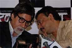 Bollywood film actor Amitabh Bachchan (L) and Ram Gopal Verma exchange words during the Hindi movie Rann press conference in Mumbai on Tuesday. AFP