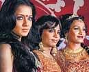 Actress Celina Jaitley with eunuchs who participate in Indias first hunt for transgender Super Queen', in Mumbai. PTI