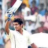 scintillating knock: Karnataka's Manish Pandey acknowledges spectators after his century against Mumbai in the  Ranji final at Manasa Gangotri Glades cricket grounds in Mysore on Thursday. DH Photo Srikanta Sharma R